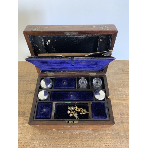 133 - A Victorian travel box, rosewood inlaid with mother of pearl, fitted interior with white metal top b... 