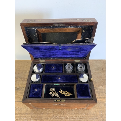 133 - A Victorian travel box, rosewood inlaid with mother of pearl, fitted interior with white metal top b... 