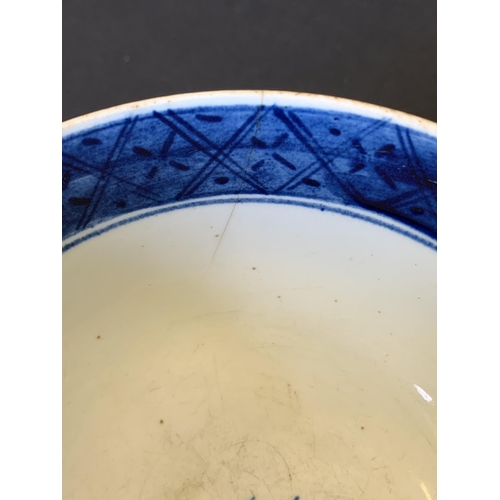 141 - Lowestoft porcelain blue and white slop bowl with Pagoda and tree decoration (hairline crack from ri... 