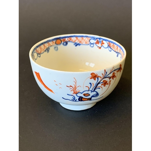 146 - Lowestoft porcelain tea bowl and saucer decorated in the Dolls House pattern (hairline crack to sauc... 