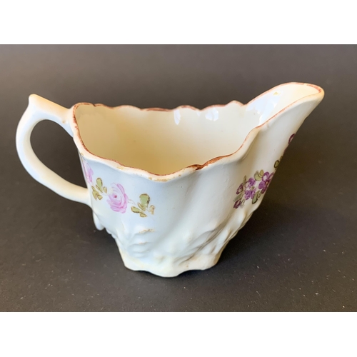 148 - Lowestoft porcelain Chelsea ewer with polychrome tulip painter type decoration (slight restoration)