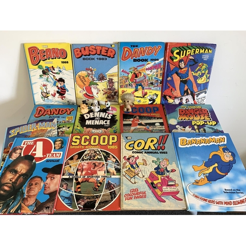 155 - A selection of mainly 1980's annuals including Beano plus a vintage 'Dam' troll doll and Sooty and S... 