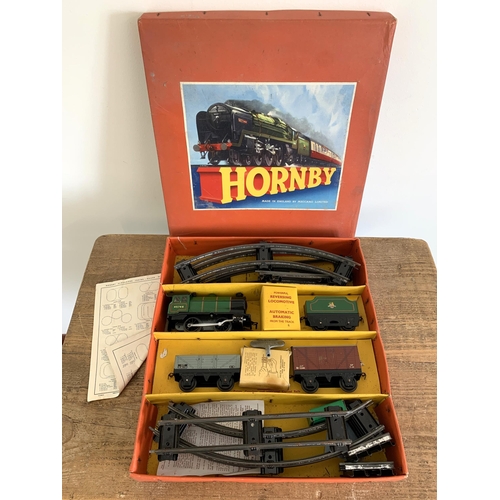 174 - A boxed Hornby 40011 clockwork goods set No.30 with key (playworn)