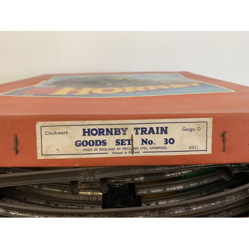 174 - A boxed Hornby 40011 clockwork goods set No.30 with key (playworn)