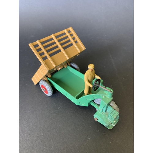 180 - Two boxed tin plate Dinky vehicles, 342 Motocarreta and 320 harvest trailer (mild playwear and boxes... 