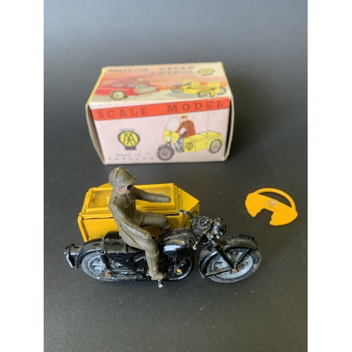 192 - A boxed 'Benbros Qualitoy' AA motorcycle patrol vehicle with rider (playworn, damage to handlebar on... 