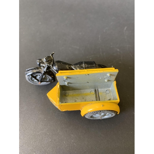 192 - A boxed 'Benbros Qualitoy' AA motorcycle patrol vehicle with rider (playworn, damage to handlebar on... 