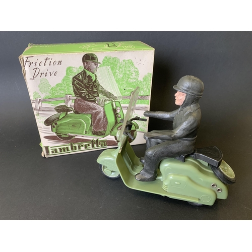 194 - A vintage late 1950's/early 1960's Mettoy friction drive Lambretta scooter in green, working order (... 