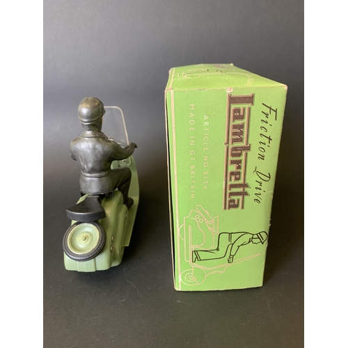 194 - A vintage late 1950's/early 1960's Mettoy friction drive Lambretta scooter in green, working order (... 