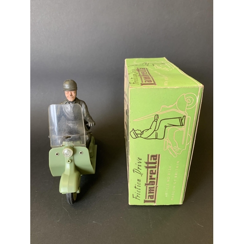 194 - A vintage late 1950's/early 1960's Mettoy friction drive Lambretta scooter in green, working order (... 