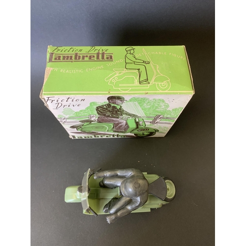 194 - A vintage late 1950's/early 1960's Mettoy friction drive Lambretta scooter in green, working order (... 