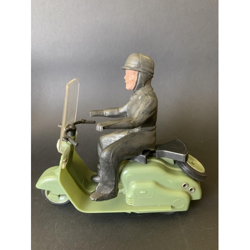 194 - A vintage late 1950's/early 1960's Mettoy friction drive Lambretta scooter in green, working order (... 