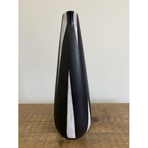 197 - A vintage West German Ruscha Pottery vase, artist marked to base possibly 'Herbert', just under 13