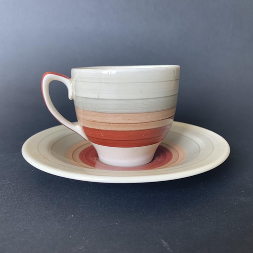 205 - Susie Cooper five setting coffee cups and saucers plus a cream jug (one cup cracked)