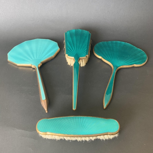 206 - A four piece brass base and blue enamel dressing table set