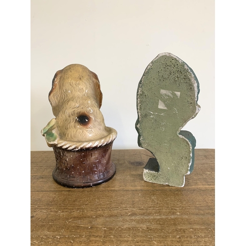 209 - Two Art Deco period plaster figures including 'Home Sweet Home' dog (both with wear to paint)