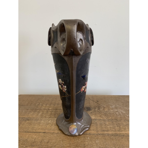 235 - An imposing Art Nouveau Bretby vase with hand painted birds with gilded outline and Ruskin style pla... 