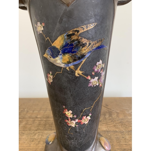 235 - An imposing Art Nouveau Bretby vase with hand painted birds with gilded outline and Ruskin style pla... 