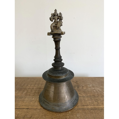 237 - A vintage Hindu Temple puja bell with Nandi figure to top, approx. 14 1/2