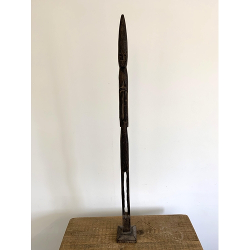 239 - A tall thin African style carved wood figure, 40 1/2