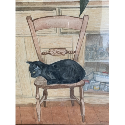 261 - A large framed and glazed watercolour of a cat in a kitchen, signed Annie Holdway May 1985, 15 1/4