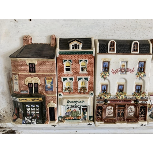 266 - A mounted run of 13 'Hazel Ceramics' shops including J Sainsbury, Thomas Cook, Rose & Crown pub etc,... 