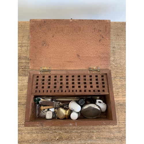 282 - A box of mixed items including music recorders, wood wares etc