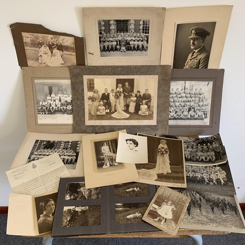 285 - A mixed lot of early 20th Century military photos, a 1920's photo album, a WW2 letter for a position... 