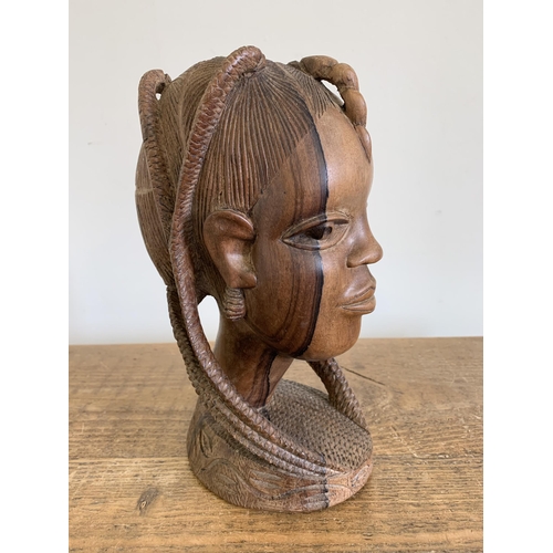 295 - A vintage West African Benin style carved wooden bust, signed F Oviasuyi to base, approx. 10