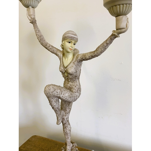 312 - A resin Art Deco style figural table lamp, 27