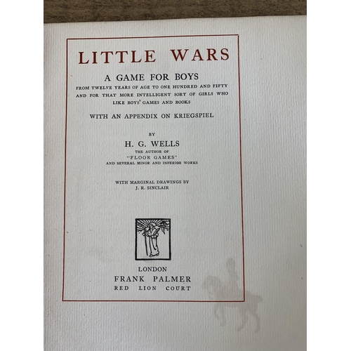 320 - A small selection of books including a 1939 first edition H G Wells 'Little Wars' (wear and damage t... 