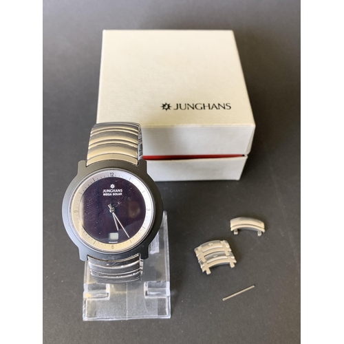 338 - A Junghans mens Mega Solar wristwatch with original strap and box