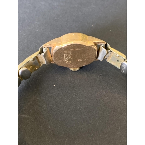 339 - A Ramona manual wind wristwatch with flexible strap, 15mm dia, case back marked 18K (dial scratched)