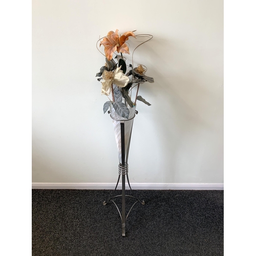 367 - A tall metal and glass vase stand with faux flowers, stand 34