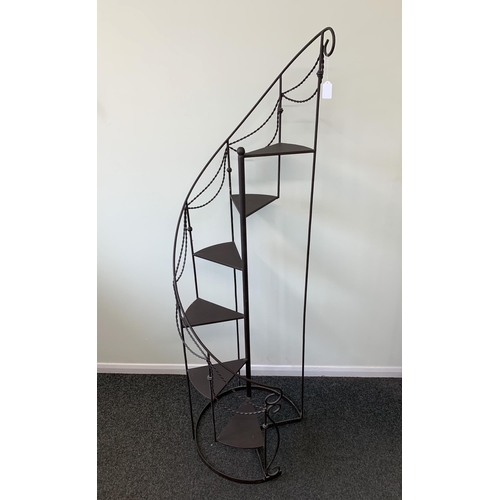 368 - An ornate tall metal constructed spiral staircase display stand, approx. 65