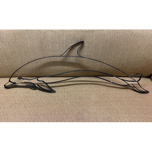 370 - A metal dolphin wall hanger