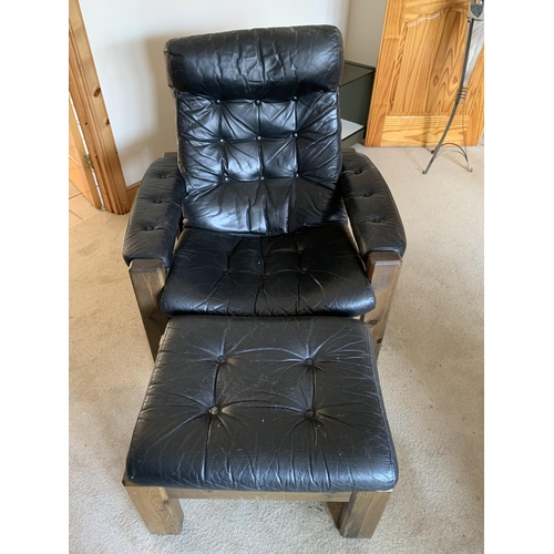 374 - A pair of vintage button back black leather adjustable armchairs, both with matching foot stools (ag... 