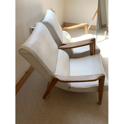 375 - A pair of vintage G-Plan white leather and lightwood Siesta armchairs (age related wear and leather ... 