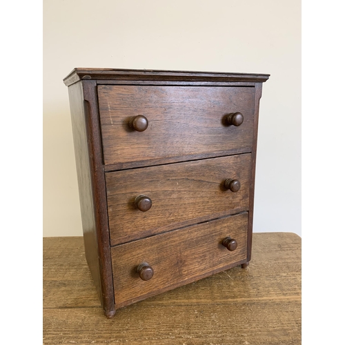 397 - A small vintage oak three drawer chest, 15