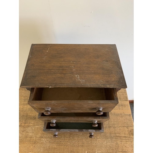 397 - A small vintage oak three drawer chest, 15