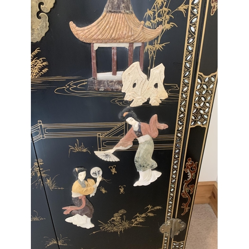 401 - A fine large vintage Chinese two door cabinet, decorated on three sides with applied coloured stones... 