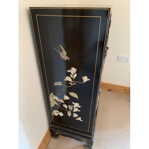 401 - A fine large vintage Chinese two door cabinet, decorated on three sides with applied coloured stones... 