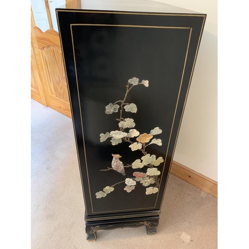 401 - A fine large vintage Chinese two door cabinet, decorated on three sides with applied coloured stones... 