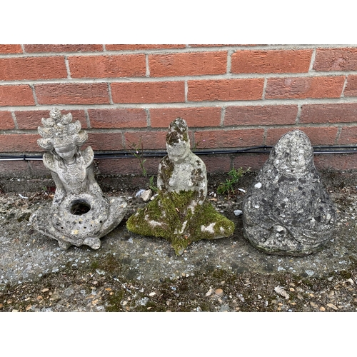 414 - Three well weathered concrete garden figurines (head detached on one)