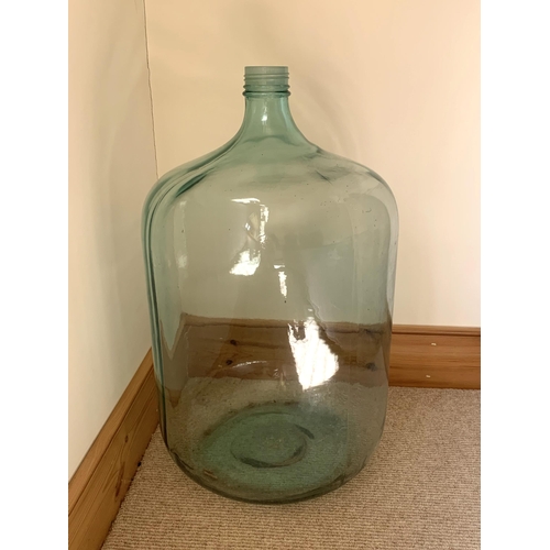 416 - A large glass carboy