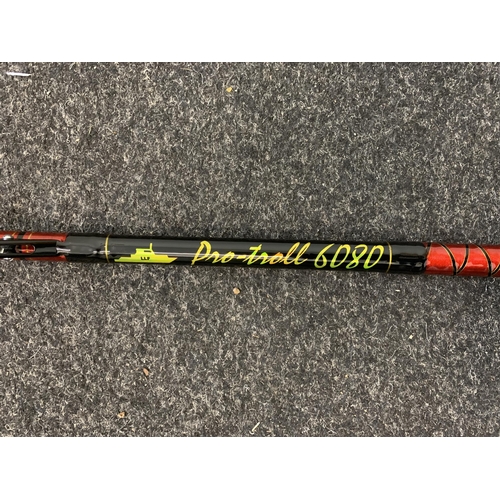 418 - A Shakespeare Ugly Stik 5ft 6 spinning rod with a Shakespeare Targa reel, in a Gardner fishing sleev... 