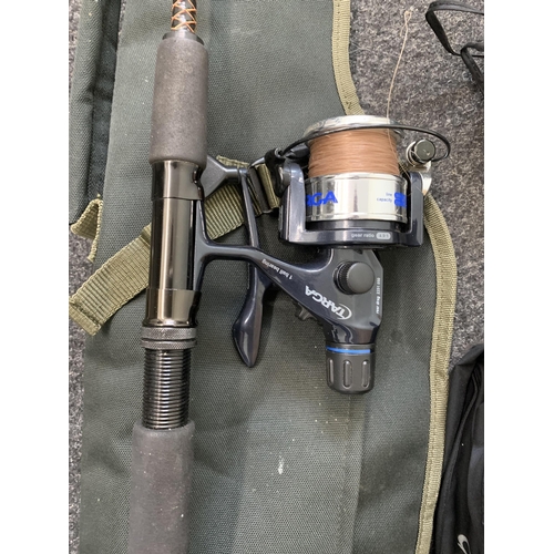 418 - A Shakespeare Ugly Stik 5ft 6 spinning rod with a Shakespeare Targa reel, in a Gardner fishing sleev... 