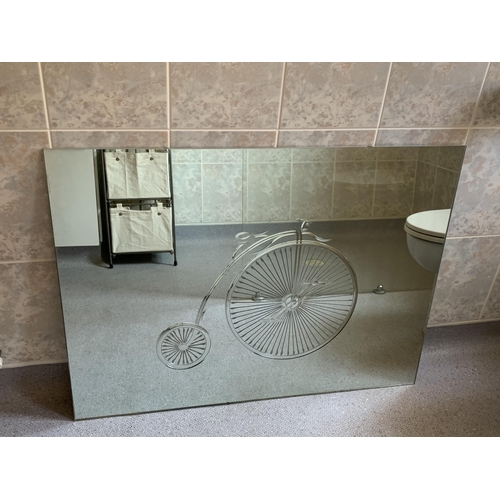 420 - A large wall mirror with bicycle decoration, approx. 40