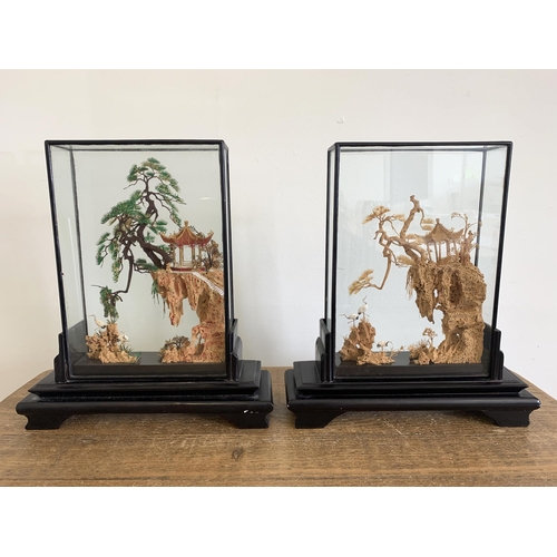 48 - A pair of vintage well carved Chinese cork dioramas in wood cases, one hand painted, 10 3/4