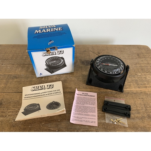 62 - A boxed 'Silva Marine 33' boat compass